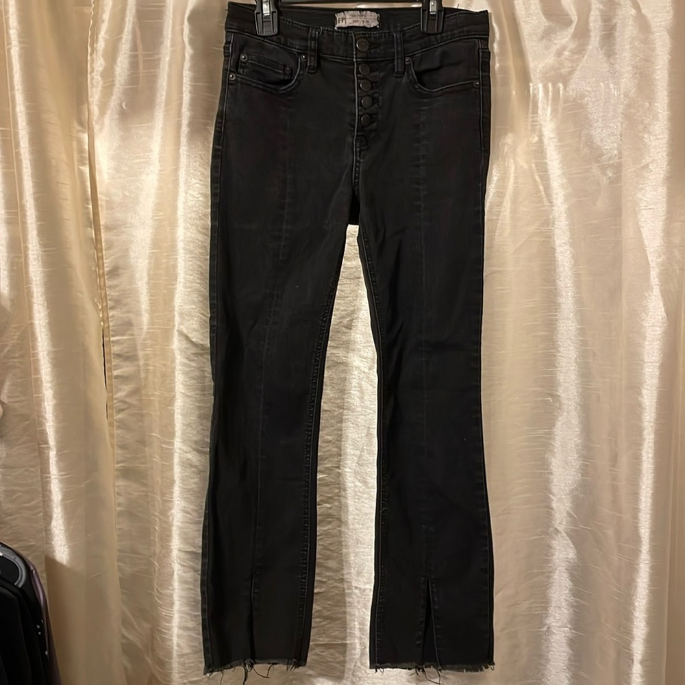 Free People button Jeans. Button fly. Fray hem. Front slit jeans